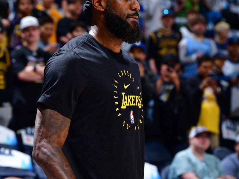 MINNEAPOLIS, MN -  APRIL 27:  LeBron James #23 of the Los Angeles Lakers warms up before the game against the Minnesota Timberwolves during Round 1 Game 4 of the 2025 NBA Playoffs on April 27, 2025 at Target Center in Minneapolis, Minnesota. NOTE TO USER: User expressly acknowledges and agrees that, by downloading and or using this Photograph, user is consenting to the terms and conditions of the Getty Images License Agreement. Mandatory Copyright Notice: Copyright 2025 NBAE (Photo by Barry Gossage/NBAE via Getty Images)