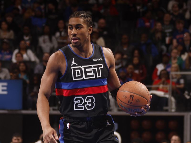 DETROIT, MI - NOOVEMBER 12:   Jaden Ivey #23 of the Detroit Pistons dribbles the ball during the game against the Miami Heat during the Emirates NBA Cup game on November 12, 2024 at Little Caesars Arena in Detroit, Michigan. NOTE TO USER: User expressly acknowledges and agrees that, by downloading and/or using this photograph, User is consenting to the terms and conditions of the Getty Images License Agreement. Mandatory Copyright Notice: Copyright 2024 NBAE (Photo by Brian Sevald/NBAE via Getty Images)