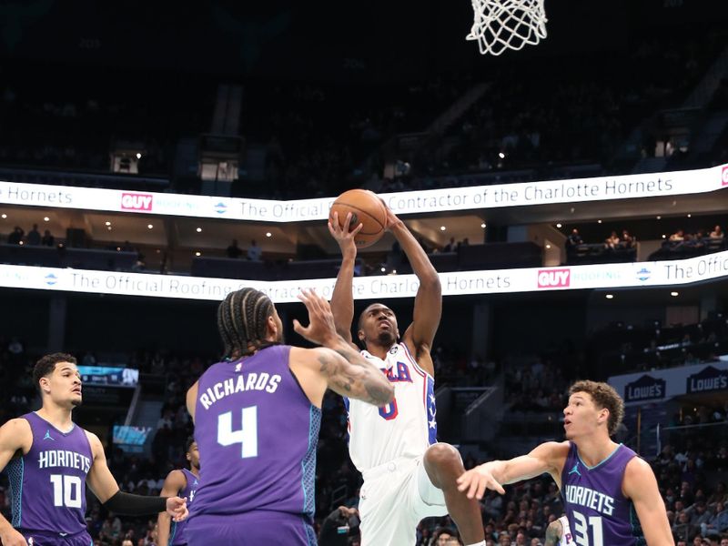 CHARLOTTE, NC - DECEMBER 3: Tyrese Maxey #0 of the Philadelphia 76ers drives to the basket during the game against the Charlotte Hornets during an NBA Emirates Cup game on December 3, 2024 at Spectrum Center in Charlotte, North Carolina. NOTE TO USER: User expressly acknowledges and agrees that, by downloading and or using this photograph, User is consenting to the terms and conditions of the Getty Images License Agreement. Mandatory Copyright Notice: Copyright 2024 NBAE (Photo by Brock Williams-Smith/NBAE via Getty Images)