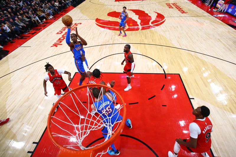 TORONTO, CANADA - DECEMBER 05: Jalen Williams #8 of the Oklahoma City Thunder shoots the ball during the game against the Toronto Raptors on December 5, 2024 at the Scotiabank Arena in Toronto, Ontario, Canada.  NOTE TO USER: User expressly acknowledges and agrees that, by downloading and or using this Photograph, user is consenting to the terms and conditions of the Getty Images License Agreement.  Mandatory Copyright Notice: Copyright 2024 NBAE (Photo by Vaughn Ridley/NBAE via Getty Images)