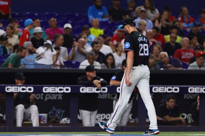 May 10, 2024; Miami, Florida, USA; Miami Marlins starting pitcher Trevor Rogers (28) exits the game against the Philadelphia Phillies during the fourth inning at loanDepot Park. Mandatory Credit: Sam Navarro-USA TODAY Sports