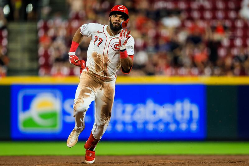 Jul 9, 2024; Cincinnati, Ohio, USA; Cincinnati Reds outfielder Rece Hinds (77) runs to third after hitting a RBI triple in the fifth inning against the Colorado Rockies at Great American Ball Park. Mandatory Credit: Katie Stratman-USA TODAY Sports