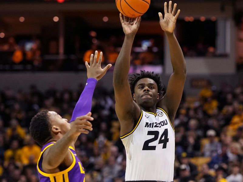 Feb 1, 2023; Columbia, Missouri, USA; Missouri Tigers guard Kobe Brown (24) shoots against LSU Tigers forward KJ Williams (12) during the first half at Mizzou Arena. Mandatory Credit: Jay Biggerstaff-USA TODAY Sports