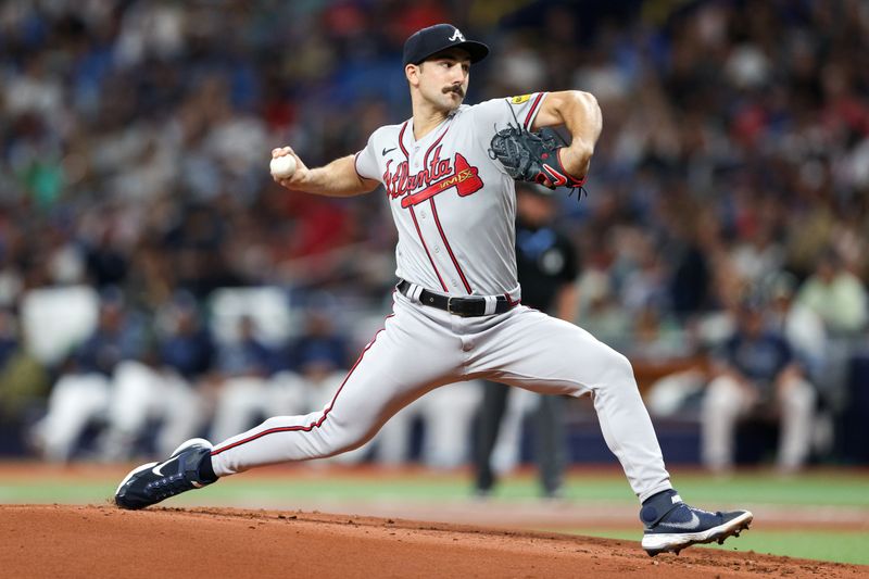 Jul 8, 2023; St. Petersburg, Florida, USA;  Atlanta Braves starting pitcher Spencer Strider (99) throws a pitch against the Tampa Bay Rays in the first inning at Tropicana Field. Mandatory Credit: Nathan Ray Seebeck-USA TODAY Sports