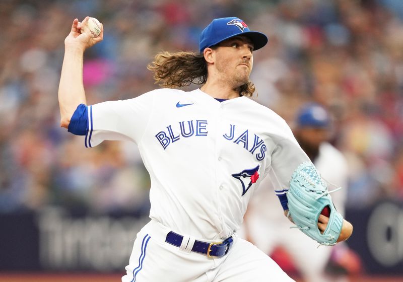 Jul 28, 2023; Toronto, Ontario, CAN; Toronto Blue Jays starting pitcher Kevin Gausman (34) throws a pitch against the Los Angeles Angels during the first inning at Rogers Centre. Mandatory Credit: Nick Turchiaro-USA TODAY Sports