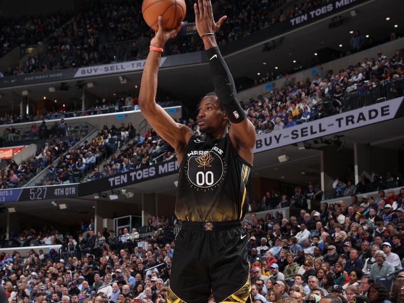 MEMPHIS, TN - MARCH 18: Jonathan Kuminga #00 of the Golden State Warriors shoots a three point basket during the game against the Memphis Grizzlies on March 18, 2023 at FedExForum in Memphis, Tennessee. NOTE TO USER: User expressly acknowledges and agrees that, by downloading and or using this photograph, User is consenting to the terms and conditions of the Getty Images License Agreement. Mandatory Copyright Notice: Copyright 2023 NBAE (Photo by Joe Murphy/NBAE via Getty Images)