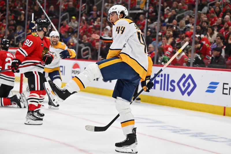 Apr 12, 2024; Chicago, Illinois, USA; Nashville Predators forward Kiefer Sherwood (44) celebrates after scoring a goal in the first period against the Chicago Blackhawks at United Center. Mandatory Credit: Jamie Sabau-USA TODAY Sports