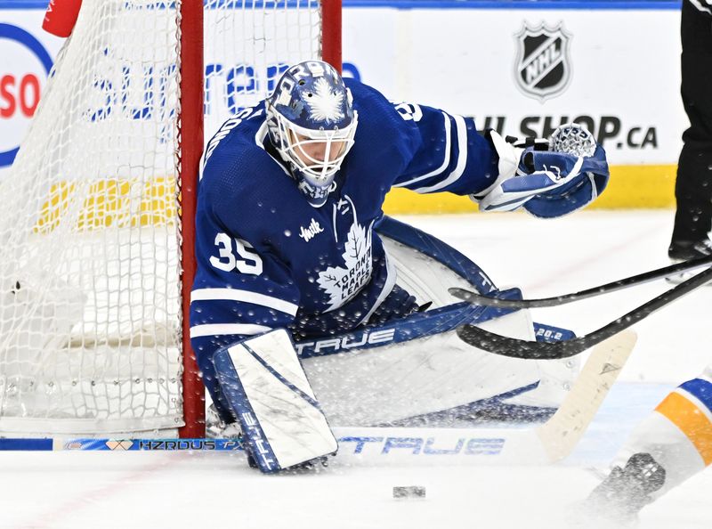 Jan 3, 2023; Toronto, Ontario, CAN; Toronto Maple Leafs goalie Ilya Samsonov (35) makes a save against the St. Louis Blues in overtime at Scotiabank Arena. Mandatory Credit: Dan Hamilton-USA TODAY Sports