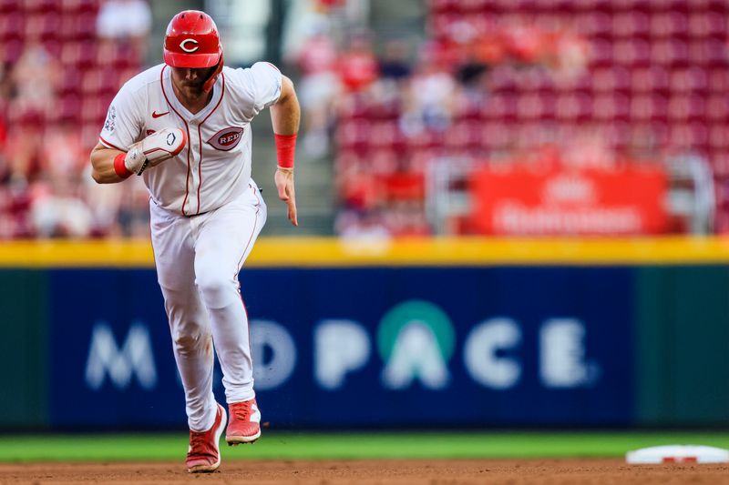 Aug 27, 2024; Cincinnati, Ohio, USA; Cincinnati Reds catcher Tyler Stephenson (37) scores on a RBI single hit by first baseman Ty France (not pictured) in the fourth inning against the Oakland Athletics at Great American Ball Park. Mandatory Credit: Katie Stratman-USA TODAY Sports