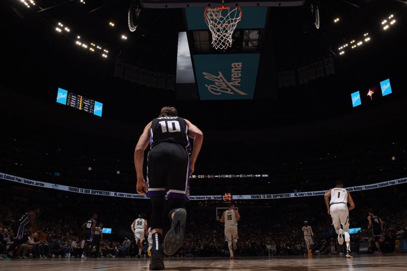 DENVER, CO - FEBRUARY 28: Domantas Sabonis #10 of the Sacramento Kings on the court during the game against the Denver Nuggets on February 28, 2024 at the Ball Arena in Denver, Colorado. NOTE TO USER: User expressly acknowledges and agrees that, by downloading and/or using this Photograph, user is consenting to the terms and conditions of the Getty Images License Agreement. Mandatory Copyright Notice: Copyright 2024 NBAE (Photo by Garrett Ellwood/NBAE via Getty Images)