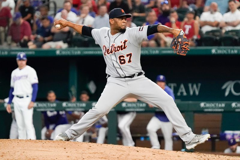 Jun 29, 2023; Arlington, Texas, USA; Detroit Tigers relief pitcher Jose Cisnero (67) throws to the plate during the seventh inning against the Texas Rangers at Globe Life Field. Mandatory Credit: Raymond Carlin III-USA TODAY Sports