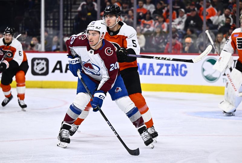 Jan 20, 2024; Philadelphia, Pennsylvania, USA; Philadelphia Flyers defenseman Egor Zamula (5) defends Colorado Avalanche center Ross Colton (20) in the first period at Wells Fargo Center. Mandatory Credit: Kyle Ross-USA TODAY Sports