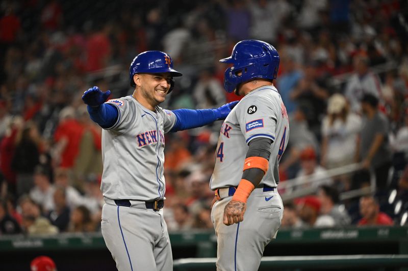 Jul 1, 2024; Washington, District of Columbia, USA; New York Mets second baseman Jose Iglesias (11) celebrates with catcher Francisco Alvarez (4) after hitting a home run against the Washington Nationals during the tenth inning at Nationals Park. Mandatory Credit: Rafael Suanes-USA TODAY Sports