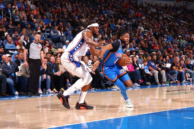 OKLAHOMA CITY, OK - MARCH 19: Isaiah Joe #11 of the Oklahoma City Thunder handles the ball during the game against the Philadelphia 76ers on March 19, 2025 at Paycom Center in Oklahoma City, Oklahoma. NOTE TO USER: User expressly acknowledges and agrees that, by downloading and or using this photograph, User is consenting to the terms and conditions of the Getty Images License Agreement. Mandatory Copyright Notice: Copyright 2025 NBAE (Photo by Zach Beeker/NBAE via Getty Images)