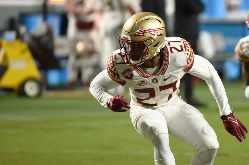 Oct 8, 2022; Raleigh, North Carolina, USA;Florida State Seminoles defensive back Akeem Dent (27) warms up prior to a game against the North Carolina State Wolfpack at Carter-Finley Stadium. Mandatory Credit: Rob Kinnan-USA TODAY Sports