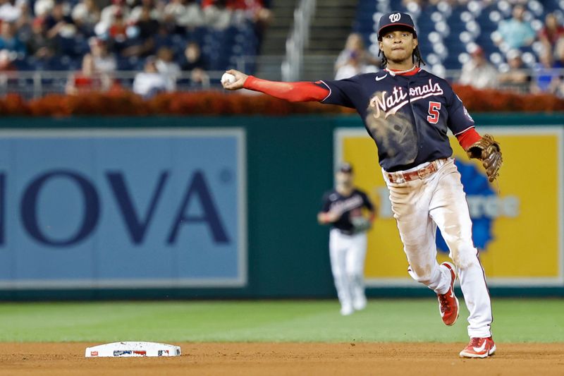 Sep 18, 2023; Washington, District of Columbia, USA; Washington Nationals shortstop CJ Abrams (5) turns a double play on a ground ball hit by Chicago White Sox shortstop Elvis Andrus (not pictured) during the fifth inning at Nationals Park. Mandatory Credit: Geoff Burke-USA TODAY Sports