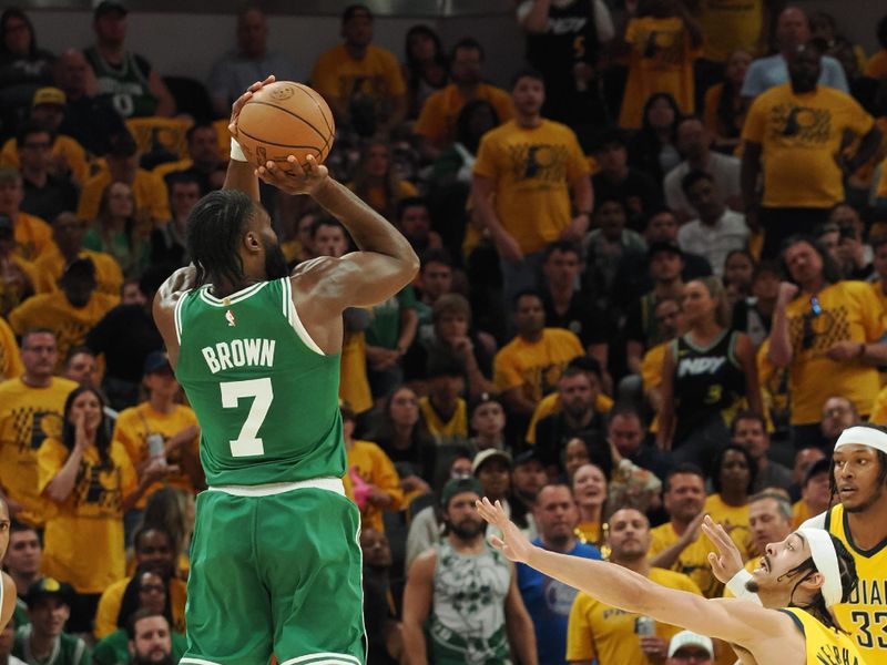 INDIANAPOLIS, IN - MAY 25: Jaylen Brown #7 of the Boston Celtics shoots a three point basket during the game  against the Indiana Pacers during Game 3 of the Eastern Conference Finals on May 25, 2024 at Gainbridge Fieldhouse in Indianapolis, Indiana. NOTE TO USER: User expressly acknowledges and agrees that, by downloading and or using this Photograph, user is consenting to the terms and conditions of the Getty Images License Agreement. Mandatory Copyright Notice: Copyright 2024 NBAE (Photo by Ron Hoskins/NBAE via Getty Images)