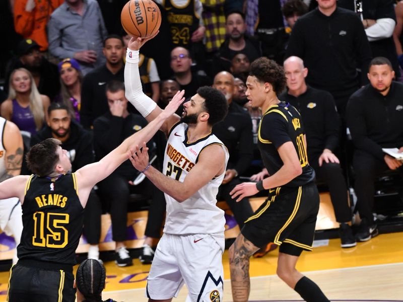 LOS ANGELES, CA - FEBRUARY 8: Jamal Murray #27 of the Denver Nuggets drives to the basket during the game against the Los Angeles Lakers on February 8, 2024 NBAE at Crypto.Com Arena in Los Angeles, California. NOTE TO USER: User expressly acknowledges and agrees that, by downloading and/or using this Photograph, user is consenting to the terms and conditions of the Getty Images License Agreement. Mandatory Copyright Notice: Copyright 2024 NBAE (Photo by Juan Ocampo/NBAE via Getty Images)