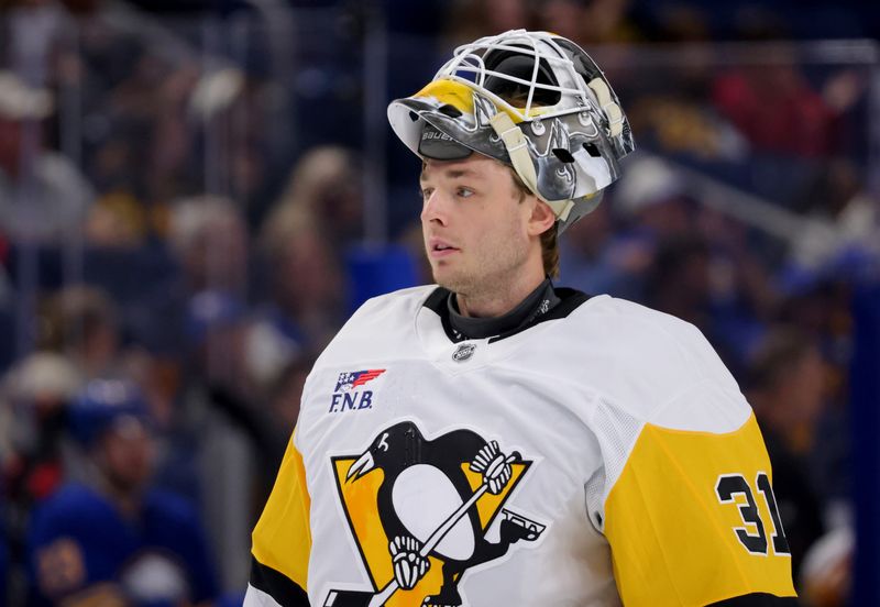 Sep 21, 2024; Buffalo, New York, USA;  Pittsburgh Penguins goalie Filip Larsson (31) during a stoppage in play against the Buffalo Sabres during the second period at KeyBank Center. Mandatory Credit: Timothy T. Ludwig-Imagn Images