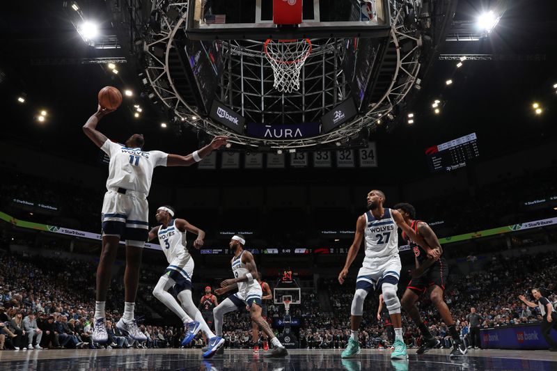 MINNEAPOLIS, MN -  APRIL 3:  Naz Reid #11 of the Minnesota Timberwolves grabs a rebound during the game against the Toronto Raptors on April 3, 2024 at Target Center in Minneapolis, Minnesota. NOTE TO USER: User expressly acknowledges and agrees that, by downloading and or using this Photograph, user is consenting to the terms and conditions of the Getty Images License Agreement. Mandatory Copyright Notice: Copyright 2024 NBAE (Photo by Jordan Johnson/NBAE via Getty Images)