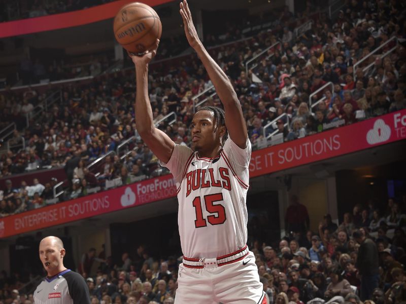 CLEVELAND, OH - November 15: Julian Phillips #15 of the Chicago Bulls shoots a three point basket during the game against the Cleveland Cavaliers during the Emirates NBA Cup game on November 15, 2024 at Rocket Mortgage FieldHouse in Cleveland, Ohio. NOTE TO USER: User expressly acknowledges and agrees that, by downloading and/or using this Photograph, user is consenting to the terms and conditions of the Getty Images License Agreement. Mandatory Copyright Notice: Copyright 2024 NBAE (Photo by David Liam Kyle/NBAE via Getty Images)