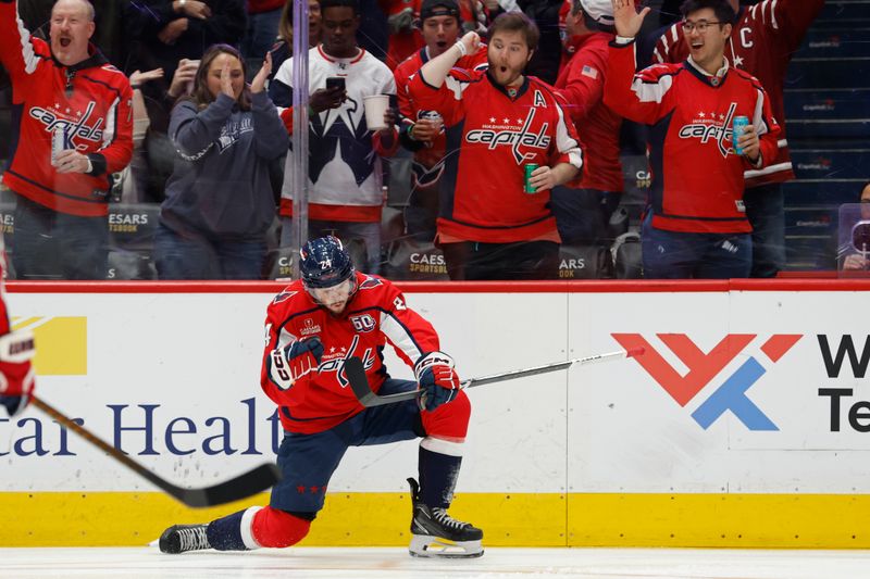 Nov 2, 2024; Washington, District of Columbia, USA; Washington Capitals center Connor McMichael (24) celebrates after scoring a goal against the Columbus Blue Jackets in the first period at Capital One Arena. Mandatory Credit: Geoff Burke-Imagn Images