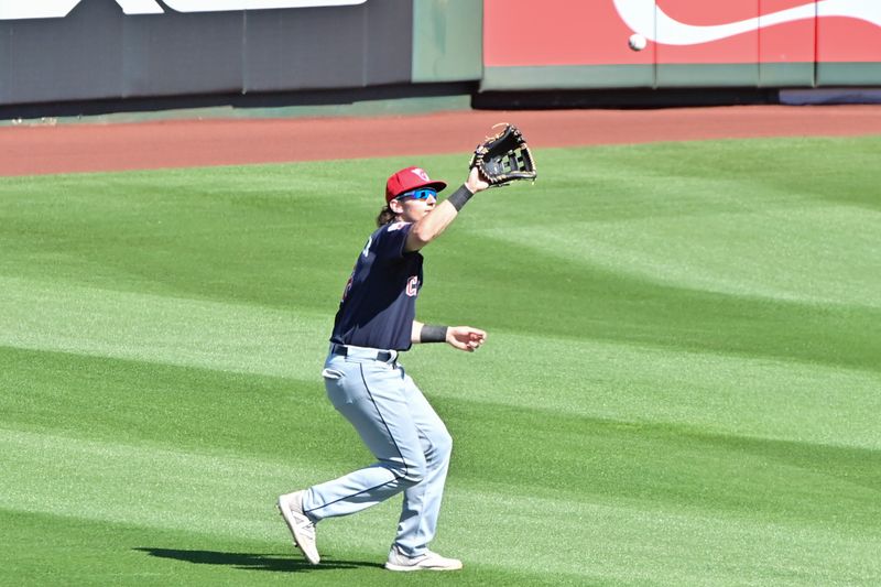 Feb 29, 2024; Tempe, Arizona, USA;  Cleveland Guardians right fielder Chase DeLauter (6) catches a fly ball in the third inning against the Los Angeles Angels during a spring training game at Tempe Diablo Stadium. Mandatory Credit: Matt Kartozian-USA TODAY Sports