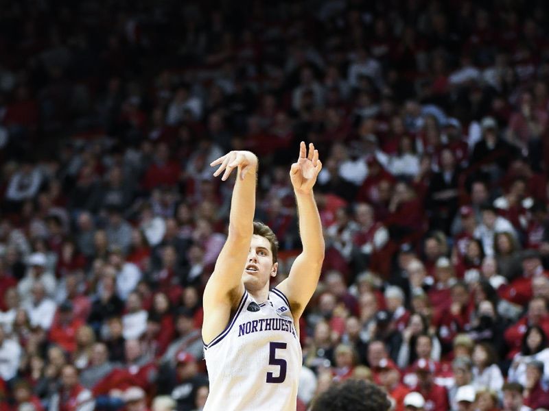 Feb 18, 2024; Bloomington, Indiana, USA;  Northwestern Wildcats guard Ryan Langborg (5) attempts a shot against the Indiana Hoosiers during the second half at Simon Skjodt Assembly Hall. Mandatory Credit: Robert Goddin-USA TODAY Sports