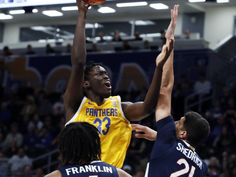 Jan 3, 2023; Pittsburgh, Pennsylvania, USA; Pittsburgh Panthers center Federiko Federiko (33) shoots against Virginia Cavaliers forward Kadin Shedrick (21) during the first half at the Petersen Events Center. Mandatory Credit: Charles LeClaire-USA TODAY Sports