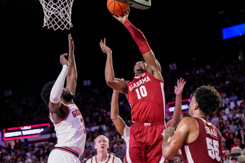 Jan 31, 2024; Athens, Georgia, USA; Alabama Crimson Tide forward Mouhamed Dioubate (10) shoots against the Georgia Bulldogs during the second half at Stegeman Coliseum. Mandatory Credit: Dale Zanine-USA TODAY Sports