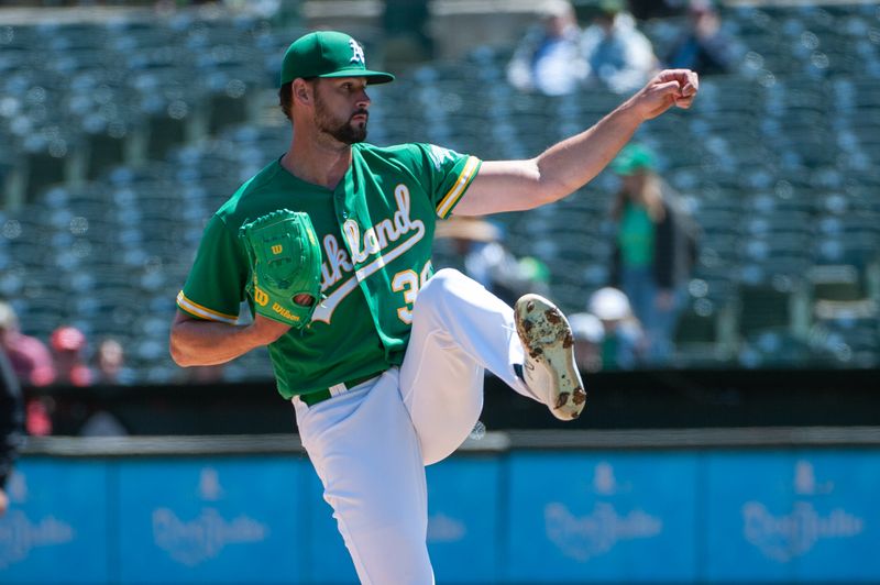 Apr 29, 2023; Oakland, California, USA; Oakland Athletics starting pitcher Kyle Muller (39) throws a pitch during the first inning against the Cincinnati Reds at RingCentral Coliseum. Mandatory Credit: Ed Szczepanski-USA TODAY Sports