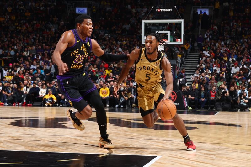 TORONTO, CANADA - APRIL 2: Immanuel Quickley #5 of the Toronto Raptors dribbles the ball during the game against the Los Angeles Lakers on April 2, 2024 at the Scotiabank Arena in Toronto, Ontario, Canada.  NOTE TO USER: User expressly acknowledges and agrees that, by downloading and or using this Photograph, user is consenting to the terms and conditions of the Getty Images License Agreement.  Mandatory Copyright Notice: Copyright 2023 NBAE (Photo by Vaughn Ridley/NBAE via Getty Images)