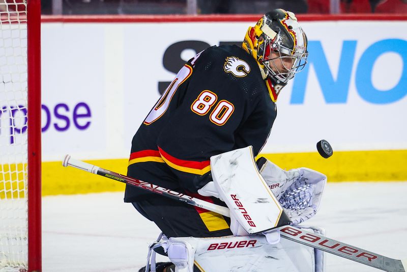 Jan 21, 2023; Calgary, Alberta, CAN; Calgary Flames goaltender Dan Vladar (80) makes a save against the Tampa Bay Lightning during the first period at Scotiabank Saddledome. Mandatory Credit: Sergei Belski-USA TODAY Sports