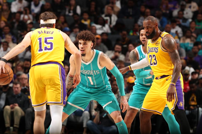 CHARLOTTE, NC - JANUARY 27:  LaMelo Ball #1 of the Charlotte Hornets plays defense during the game against the Los Angeles Lakers on January 27, 2025 at Spectrum Center in Charlotte, North Carolina. NOTE TO USER: User expressly acknowledges and agrees that, by downloading and or using this photograph, User is consenting to the terms and conditions of the Getty Images License Agreement. Mandatory Copyright Notice: Copyright 2025 NBAE (Photo by Kent Smith/NBAE via Getty Images)