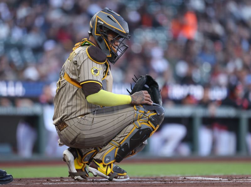 Jun 3, 2025; San Francisco, California, USA; San Diego Padres catcher Martin Maldonado (15) between plays against the San Francisco Giants during the first inning at Oracle Park. Mandatory Credit: Kelley L Cox-Imagn Images