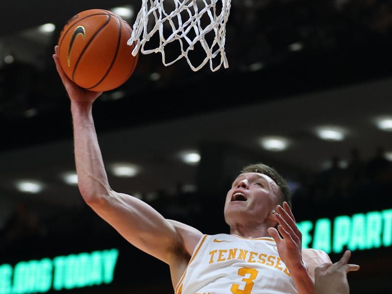 Jan 6, 2024; Knoxville, Tennessee, USA; Tennessee Volunteers guard Dalton Knecht (3) goes to the basket against the Mississippi Rebels during the first half at Thompson-Boling Arena at Food City Center. Mandatory Credit: Randy Sartin-USA TODAY Sports