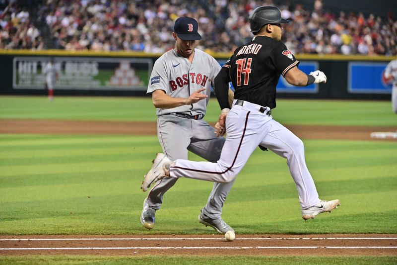 May 27, 2023; Phoenix, Arizona, USA;  Boston Red Sox relief pitcher Kutter Crawford (50) fields a ball as Arizona Diamondbacks catcher Gabriel Moreno (14) runs to first base in the eighth inning at Chase Field. Mandatory Credit: Matt Kartozian-USA TODAY Sports