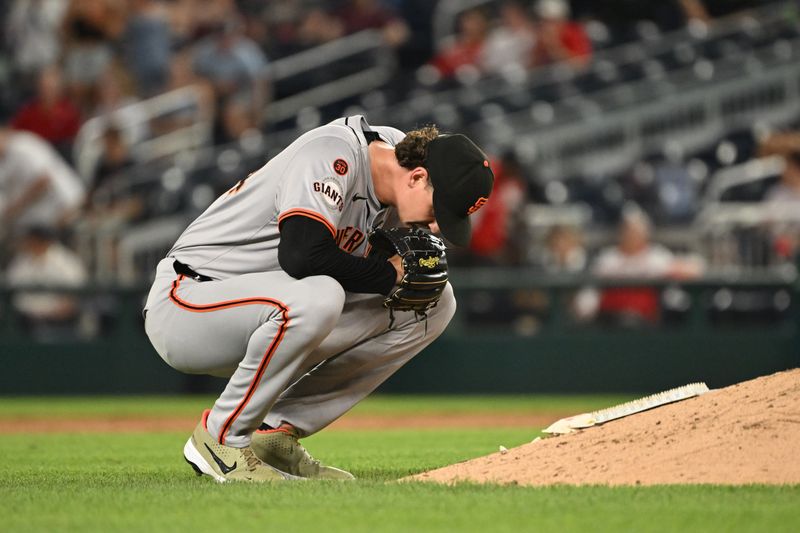 Aug 6, 2024; Washington, District of Columbia, USA; San Francisco Giants relief pitcher Sean Hjelle (64) takes a moment behind the pitchers mound against the Washington Nationals during the sixth inning at Nationals Park. Mandatory Credit: Rafael Suanes-USA TODAY Sports