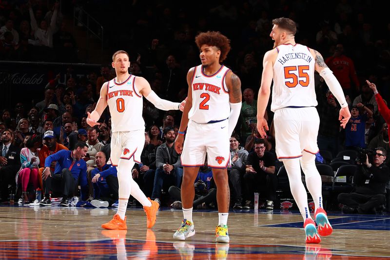 NEW YORK, NY - MARCH 25:  Donte Divincenzo #0 of the New York Knicks reacts after sinking a three point basket during the game against the Detroit Pistons on March 25, 2024 at Madison Square Garden in New York City, New York.  NOTE TO USER: User expressly acknowledges and agrees that, by downloading and or using this photograph, User is consenting to the terms and conditions of the Getty Images License Agreement. Mandatory Copyright Notice: Copyright 2024 NBAE  (Photo by David L. Nemec /NBAE via Getty Images)