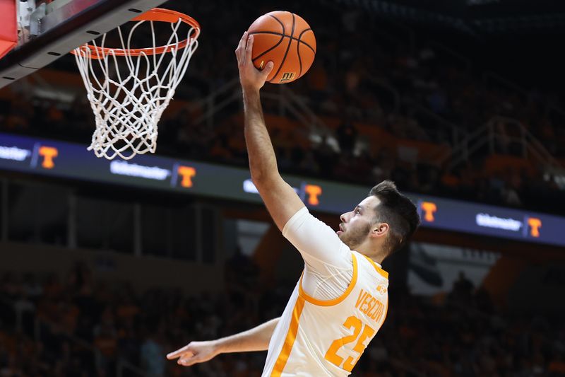 Feb 28, 2023; Knoxville, Tennessee, USA; Tennessee Volunteers guard Santiago Vescovi (25) goes to the basket against the Arkansas Razorbacks during the first half at Thompson-Boling Arena. Mandatory Credit: Randy Sartin-USA TODAY Sports