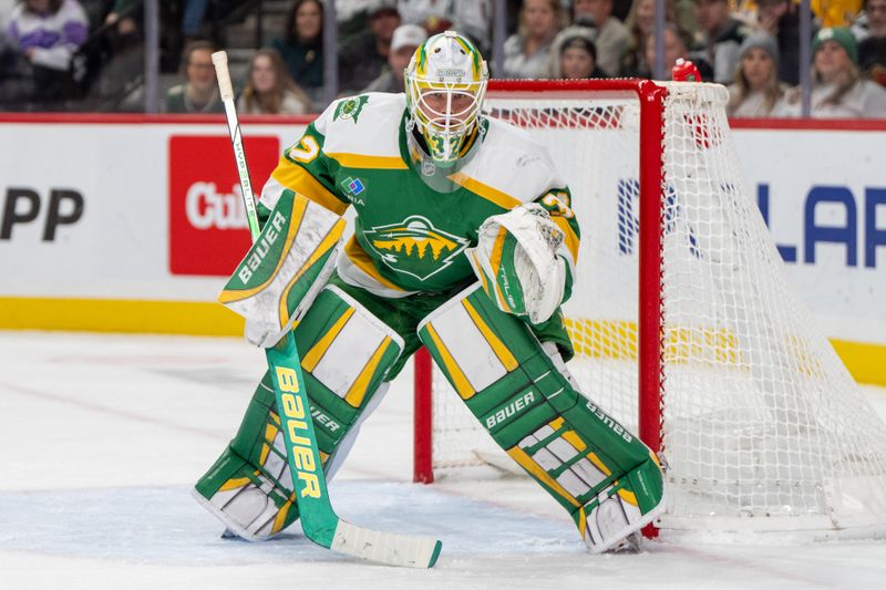 Dec 31, 2024; Saint Paul, Minnesota, USA; Minnesota Wild goaltender Filip Gustavsson (32) watches play agains the Nashville Predators in the third period at Xcel Energy Center. Mandatory Credit: Matt Blewett-Imagn Images