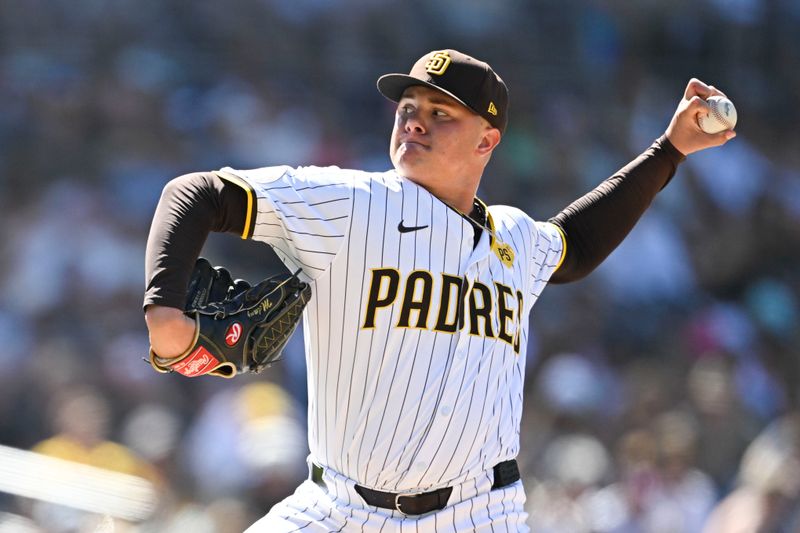 August 14, 2024; San Diego, California, USA; San Diego Padres pitcher Adrian Morejon (50) delivers against the Pittsburgh Pirates during the ninth inning at Petco Park. Mandatory Credit: Denis Poroy-USA TODAY Sports at Petco Park. 