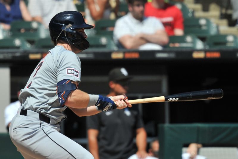 Aug 25, 2024; Chicago, Illinois, USA; Detroit Tigers second base Jace Jung (17) singles during the third inning against the Chicago White Sox at Guaranteed Rate Field. Mandatory Credit: Patrick Gorski-USA TODAY Sports