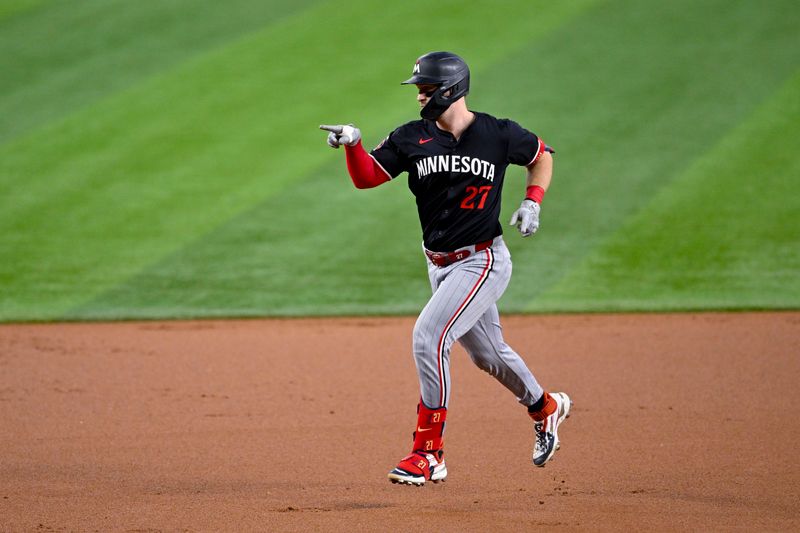 Aug 18, 2024; Arlington, Texas, USA; Minnesota Twins catcher Ryan Jeffers (27) rounds the bases after he hits a two run home run against the Texas Rangers during the first inning at Globe Life Field. Mandatory Credit: Jerome Miron-USA TODAY Sports