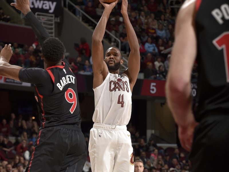 CLEVELAND, OH - NOVEMBER 24: Evan Mobley #4 of the Cleveland Cavaliers shoots the ball during the game against the Toronto Raptors on November 24, 2024 at Rocket Mortgage FieldHouse in Cleveland, Ohio. NOTE TO USER: User expressly acknowledges and agrees that, by downloading and/or using this Photograph, user is consenting to the terms and conditions of the Getty Images License Agreement. Mandatory Copyright Notice: Copyright 2024 NBAE (Photo by David Liam Kyle/NBAE via Getty Images)