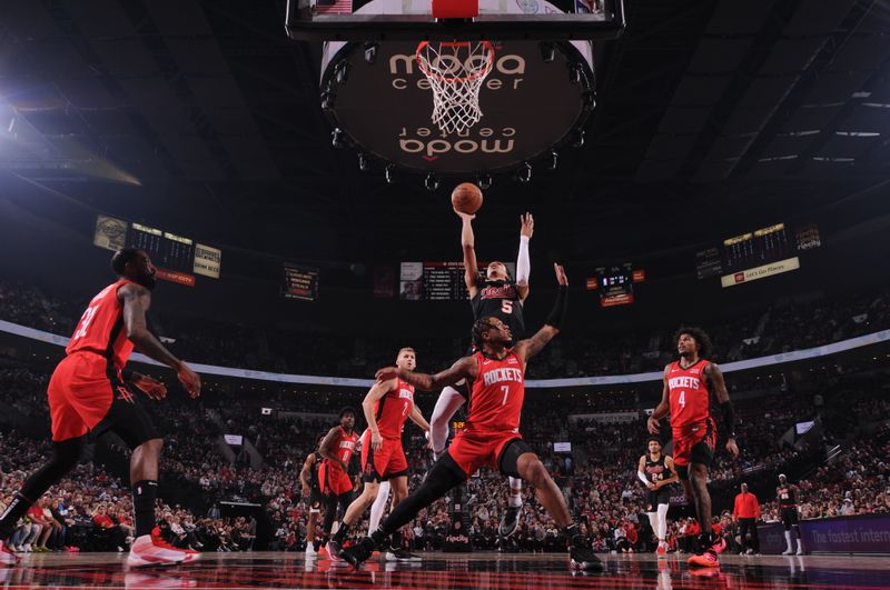 PORTLAND, OR - APRIL 12: Dalano Banton #5 of the Portland Trail Blazers shoots the ball during the game during the game against the Houston Rockets on April 12, 2024 at the Moda Center Arena in Portland, Oregon. NOTE TO USER: User expressly acknowledges and agrees that, by downloading and or using this photograph, user is consenting to the terms and conditions of the Getty Images License Agreement. Mandatory Copyright Notice: Copyright 2024 NBAE (Photo by Cameron Browne/NBAE via Getty Images)