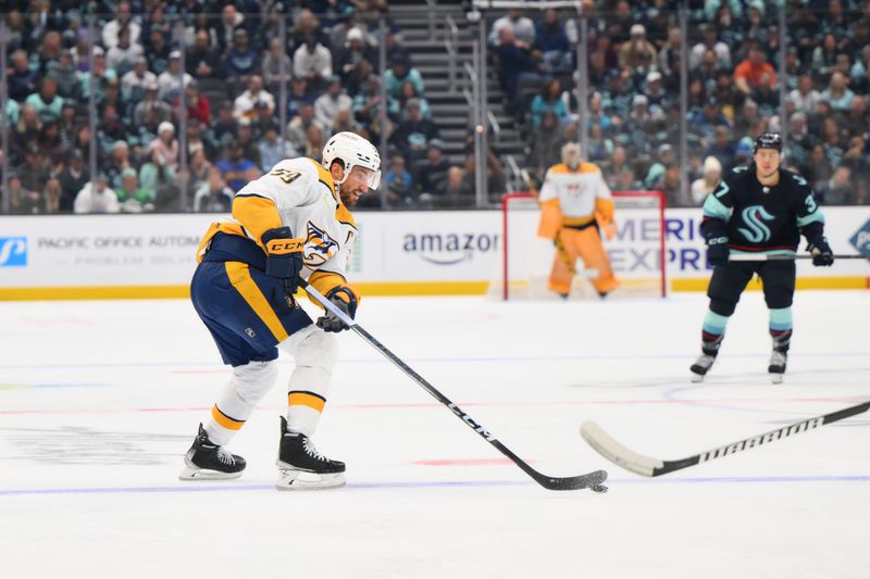 Nov 2, 2023; Seattle, Washington, USA; Nashville Predators defenseman Roman Josi (59) plays the puck during the second period against the Seattle Kraken at Climate Pledge Arena. Mandatory Credit: Steven Bisig-USA TODAY Sports