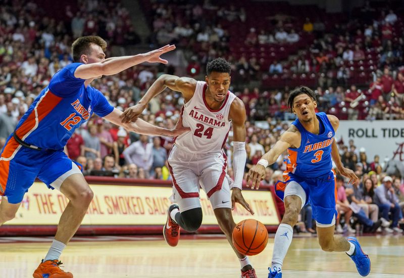 Feb 8, 2023; Tuscaloosa, Alabama, USA; Alabama Crimson Tide forward Brandon Miller (24) drives to the basket against Florida Gators forward Colin Castleton (12) during the second half at Coleman Coliseum. Mandatory Credit: Marvin Gentry-USA TODAY Sports