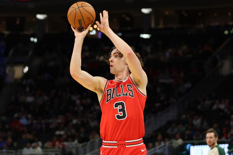 MILWAUKEE, WISCONSIN - OCTOBER 14: Josh Giddey #3 of the Chicago Bulls takes a three point shot during the first half of a preseason game against the Milwaukee Bucks at Fiserv Forum on October 14, 2024 in Milwaukee, Wisconsin. NOTE TO USER: User expressly acknowledges and agrees that, by downloading and or using this photograph, User is consenting to the terms and conditions of the Getty Images License Agreement. (Photo by Stacy Revere/Getty Images)