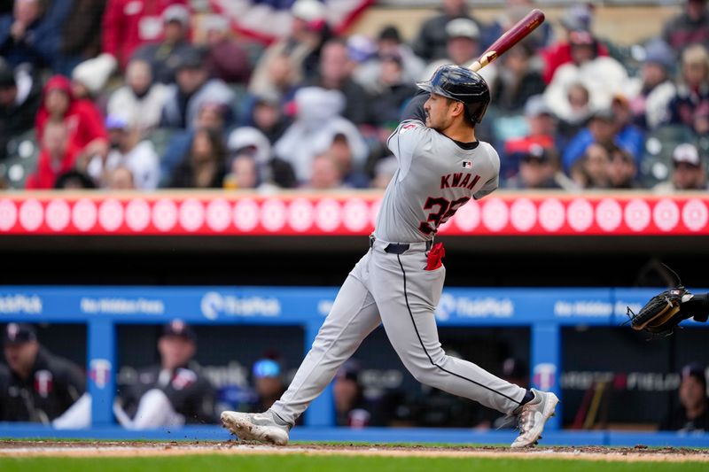 Apr 4, 2024; Minneapolis, Minnesota, USA; Cleveland Guardians left fielder Steven Kwan (38) hits a double during the fifth inning against the Minnesota Twins at Target Field. Mandatory Credit: Jordan Johnson-USA TODAY Sports